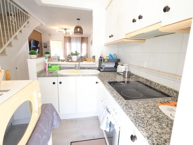 Torre de la Horadada duplex townhouse located directly in front of the communal pool