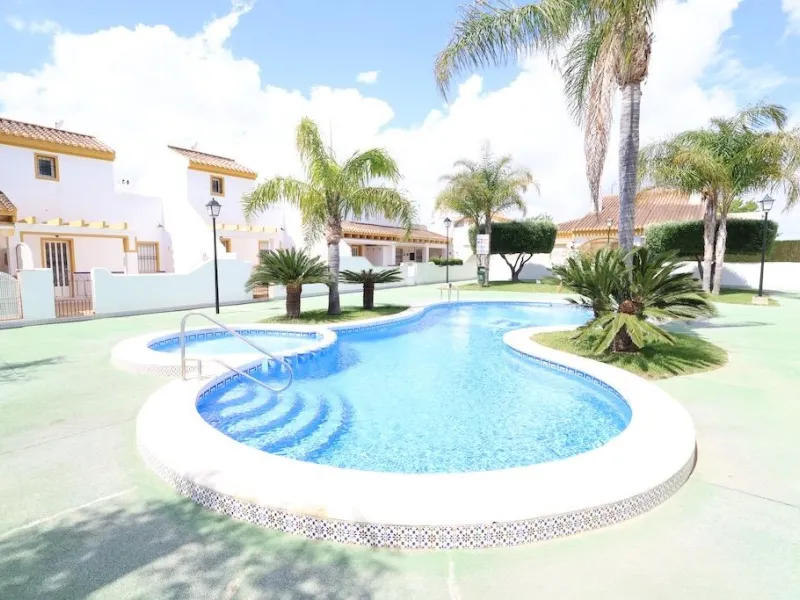 Torre de la Horadada duplex townhouse located directly in front of the communal pool