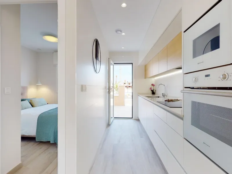 ADOSADOS DE OBRA NUEVA EN PILAR DE LA HORADADA. 3 DORM. 2 BAÑOS. CON PLAZA DE GARAJE Y PISCINA. 83 M2. JARDIN 33 M2. SOLARIUM 34 M2.