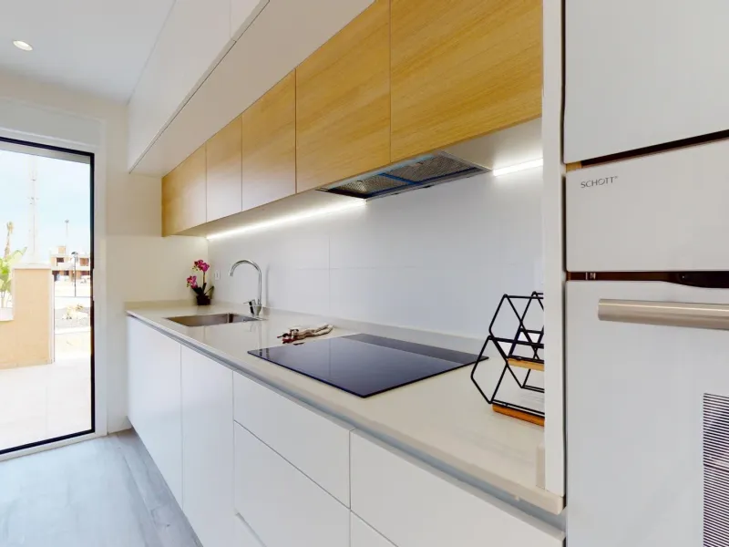 ADOSADOS DE OBRA NUEVA EN PILAR DE LA HORADADA. 3 DORM. 2 BAÑOS. CON PLAZA DE GARAJE Y PISCINA. 83 M2. JARDIN 33 M2. SOLARIUM 34 M2.