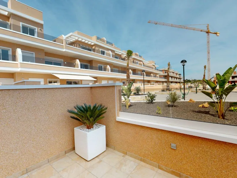 ADOSADOS DE OBRA NUEVA EN PILAR DE LA HORADADA. 3 DORM. 2 BAÑOS. CON PLAZA DE GARAJE Y PISCINA. 83 M2. JARDIN 33 M2. SOLARIUM 34 M2.