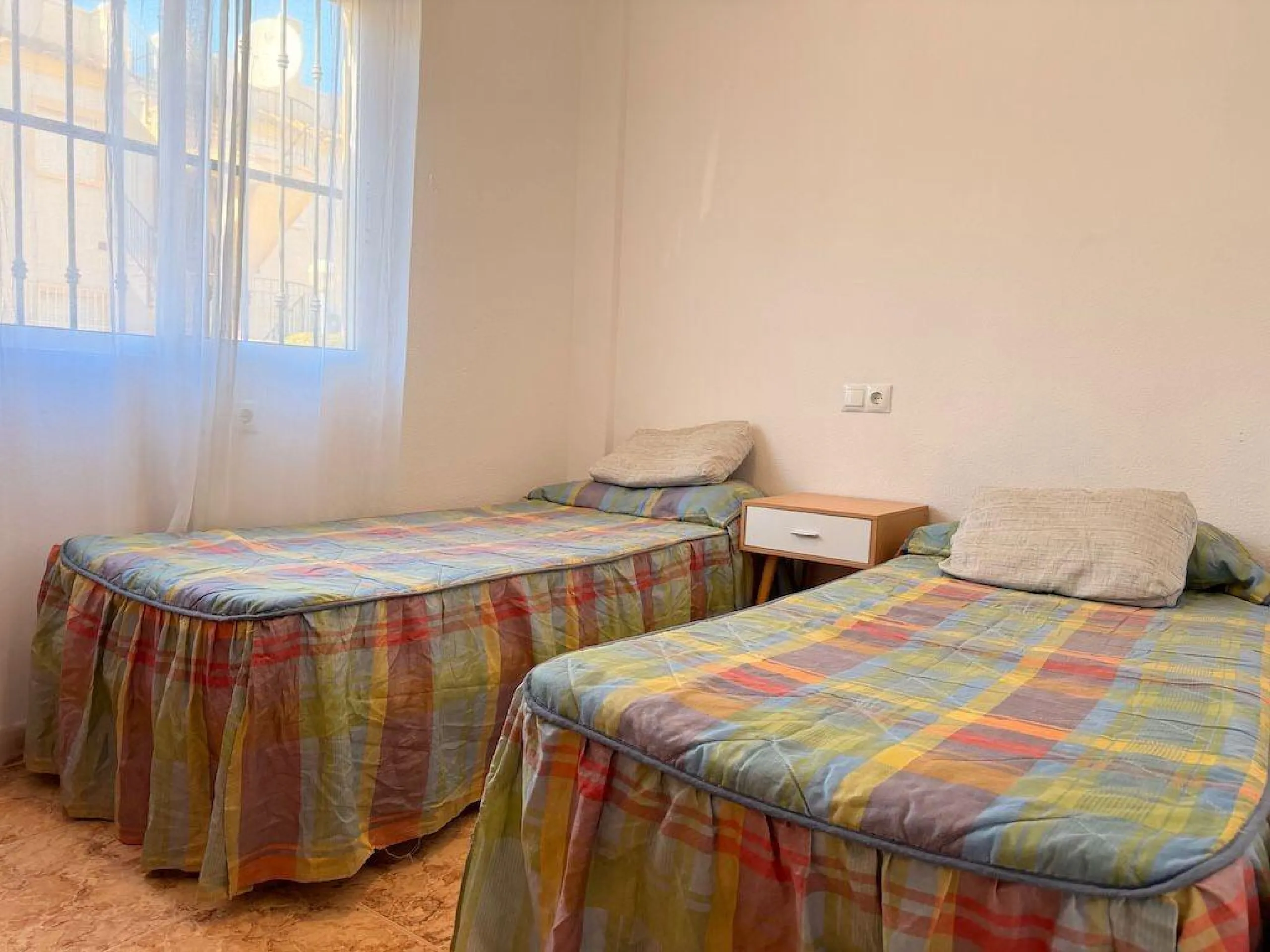 Villamartin, St. James Hills Residential – Ground-floor bungalow overlooking a 50 m² communal garden.
