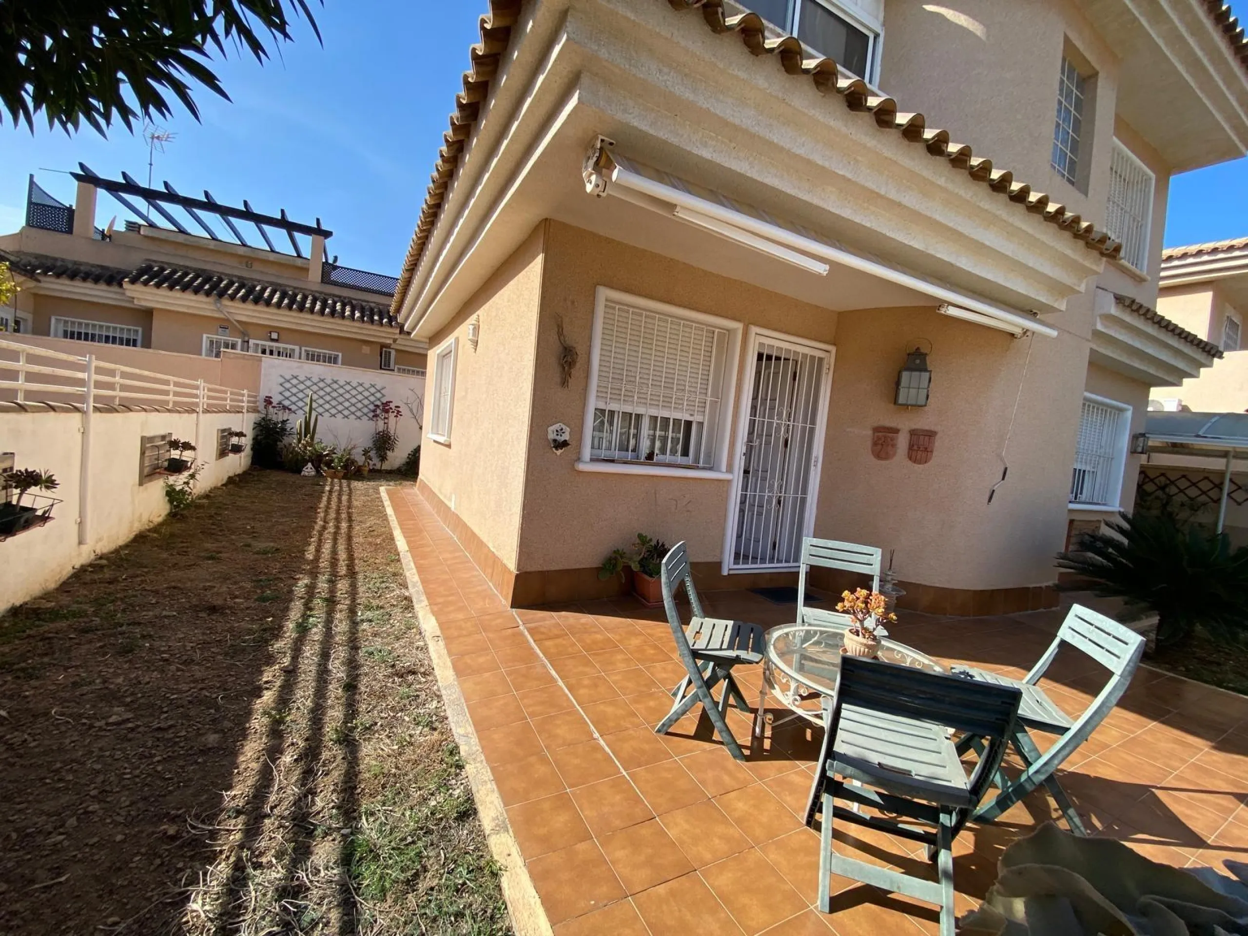 House with large plot, parking, and communal pool