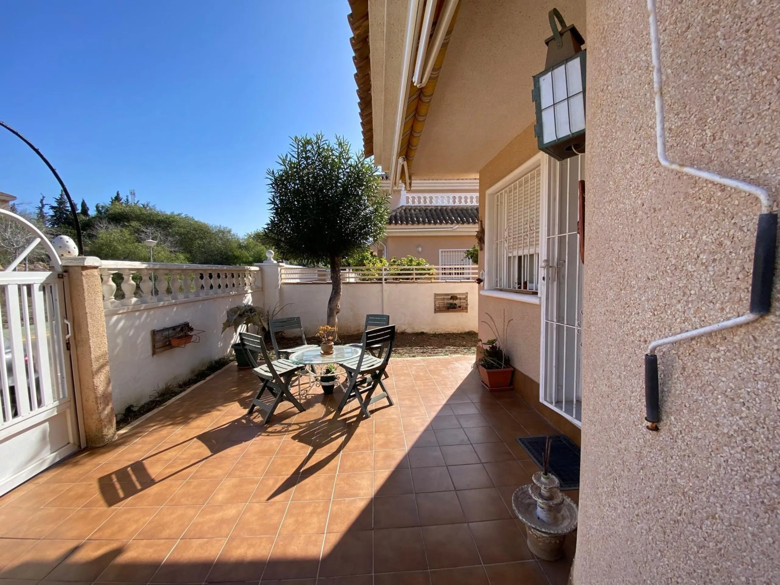 House with large plot, parking, and communal pool