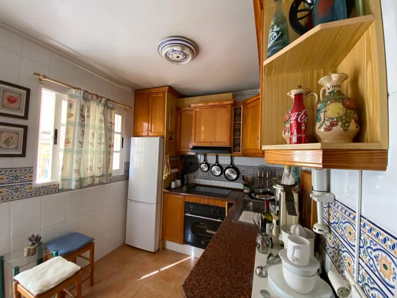 House with large plot, parking, and communal pool