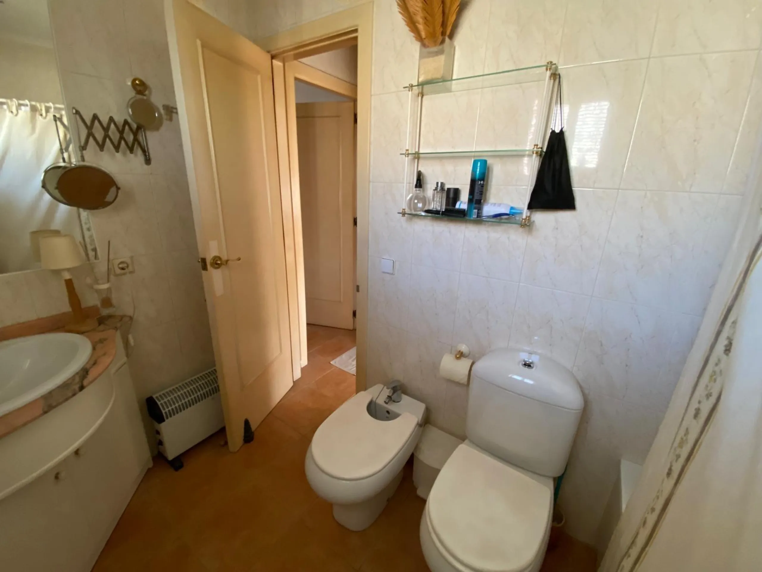 House with large plot, parking, and communal pool