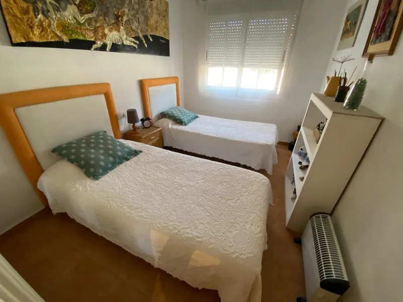 House with large plot, parking, and communal pool