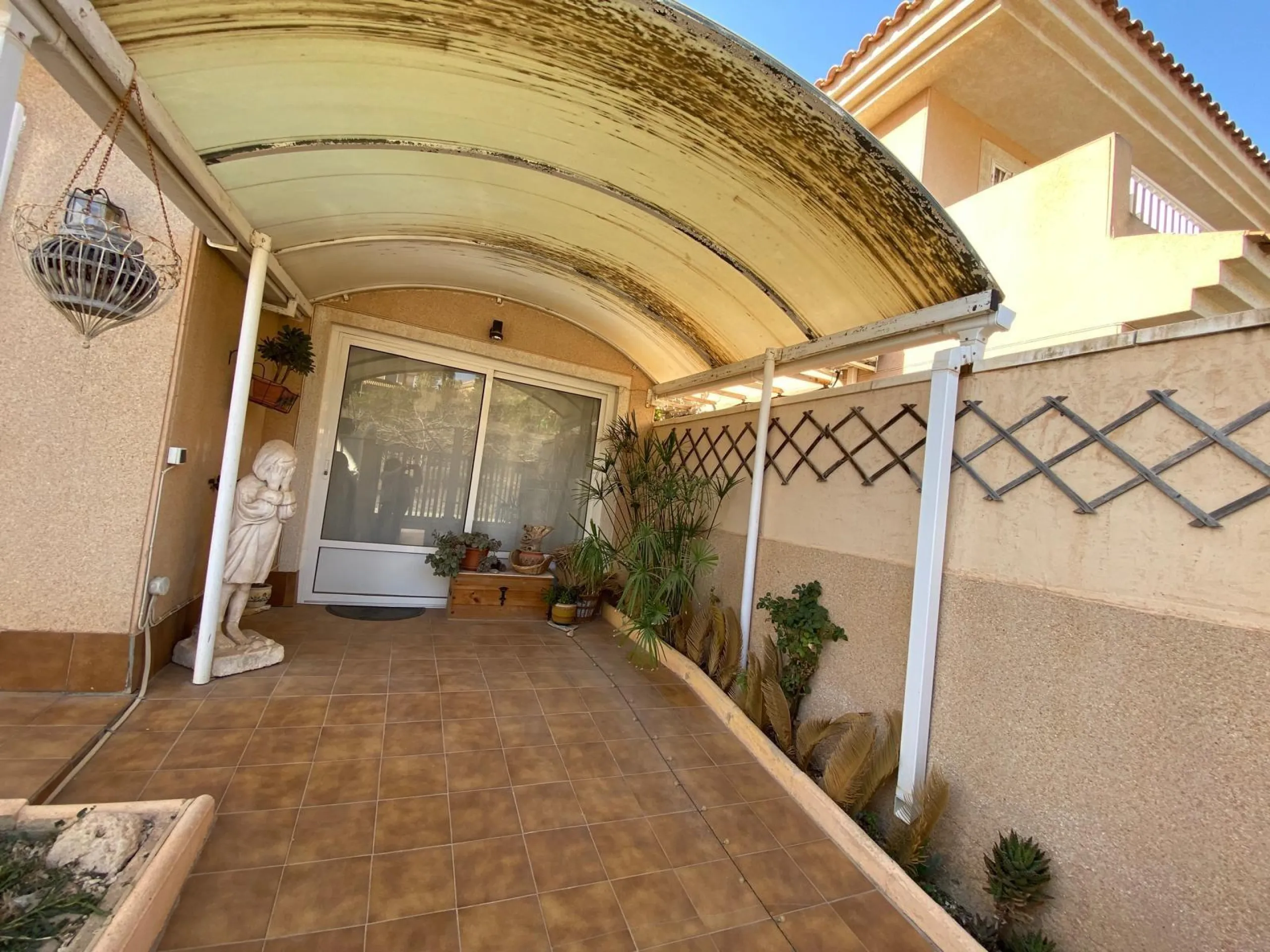 House with large plot, parking, and communal pool