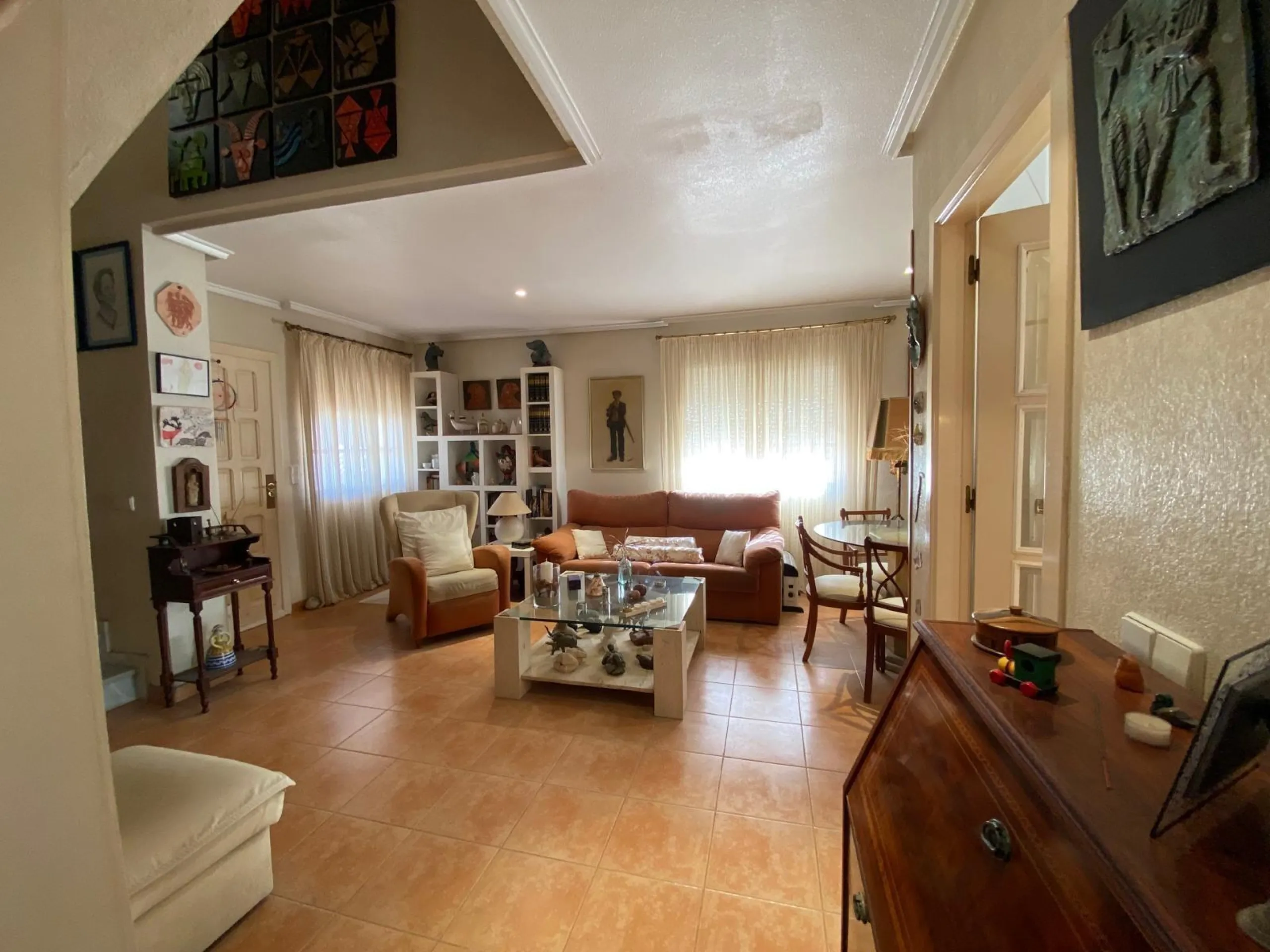 House with large plot, parking, and communal pool