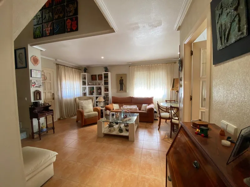 House with large plot, parking, and communal pool