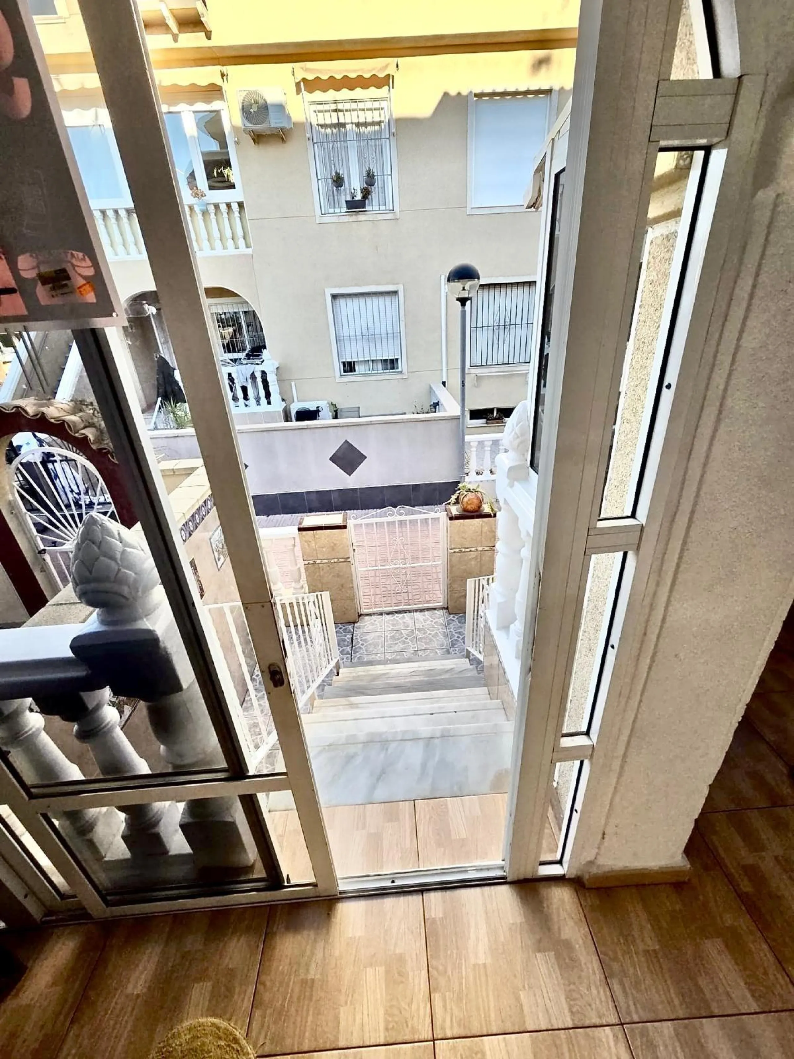 Townhouse with private garage, solarium and pool in Laguna, Orihuela Costa – excellent potential