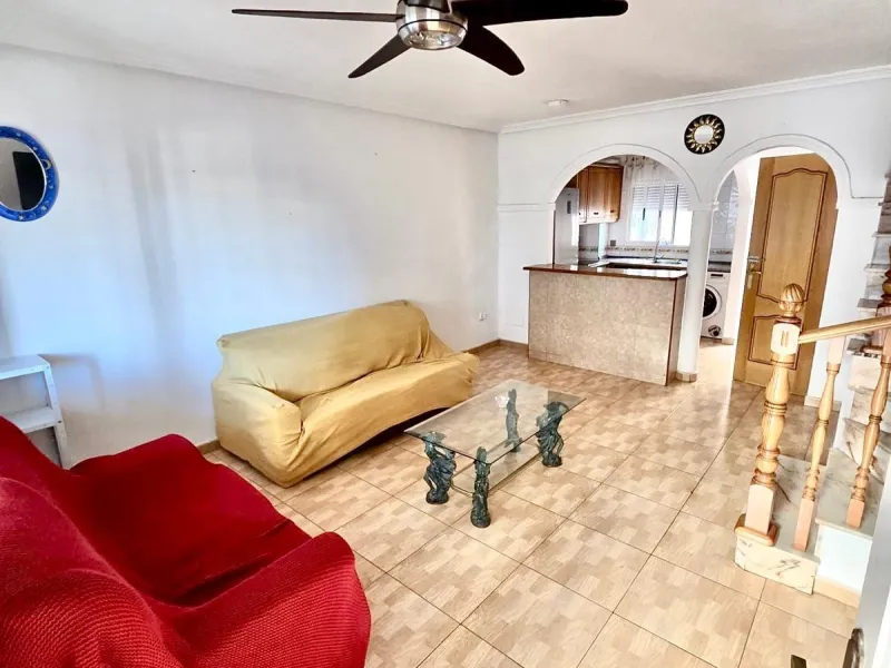 Townhouse with private garage, solarium and pool in Laguna, Orihuela Costa – excellent potential