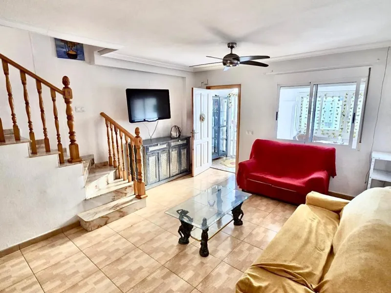 Townhouse with private garage, solarium and pool in Laguna, Orihuela Costa – excellent potential
