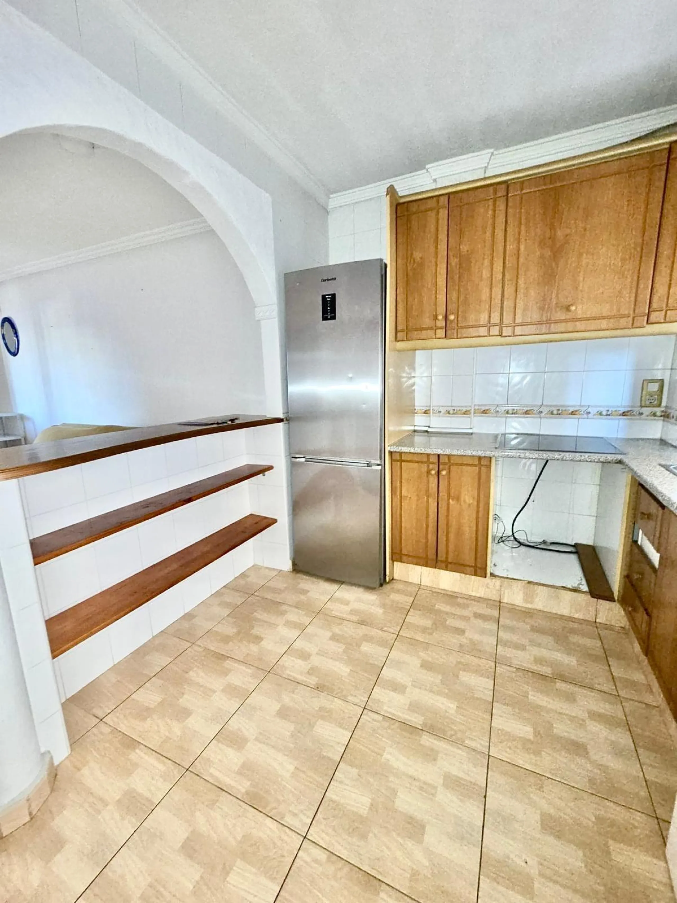 Townhouse with private garage, solarium and pool in Laguna, Orihuela Costa – excellent potential