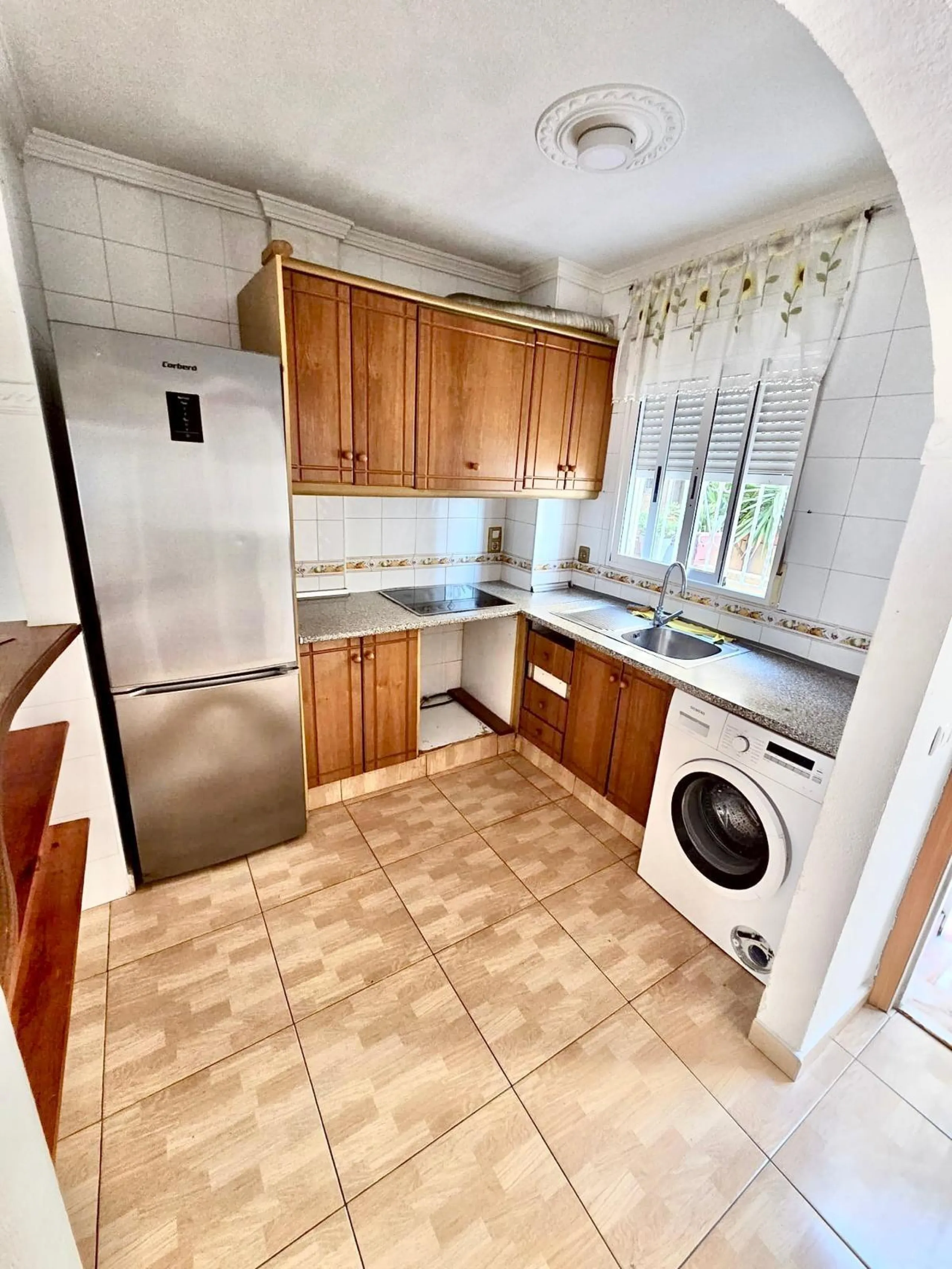 Townhouse with private garage, solarium and pool in Laguna, Orihuela Costa – excellent potential