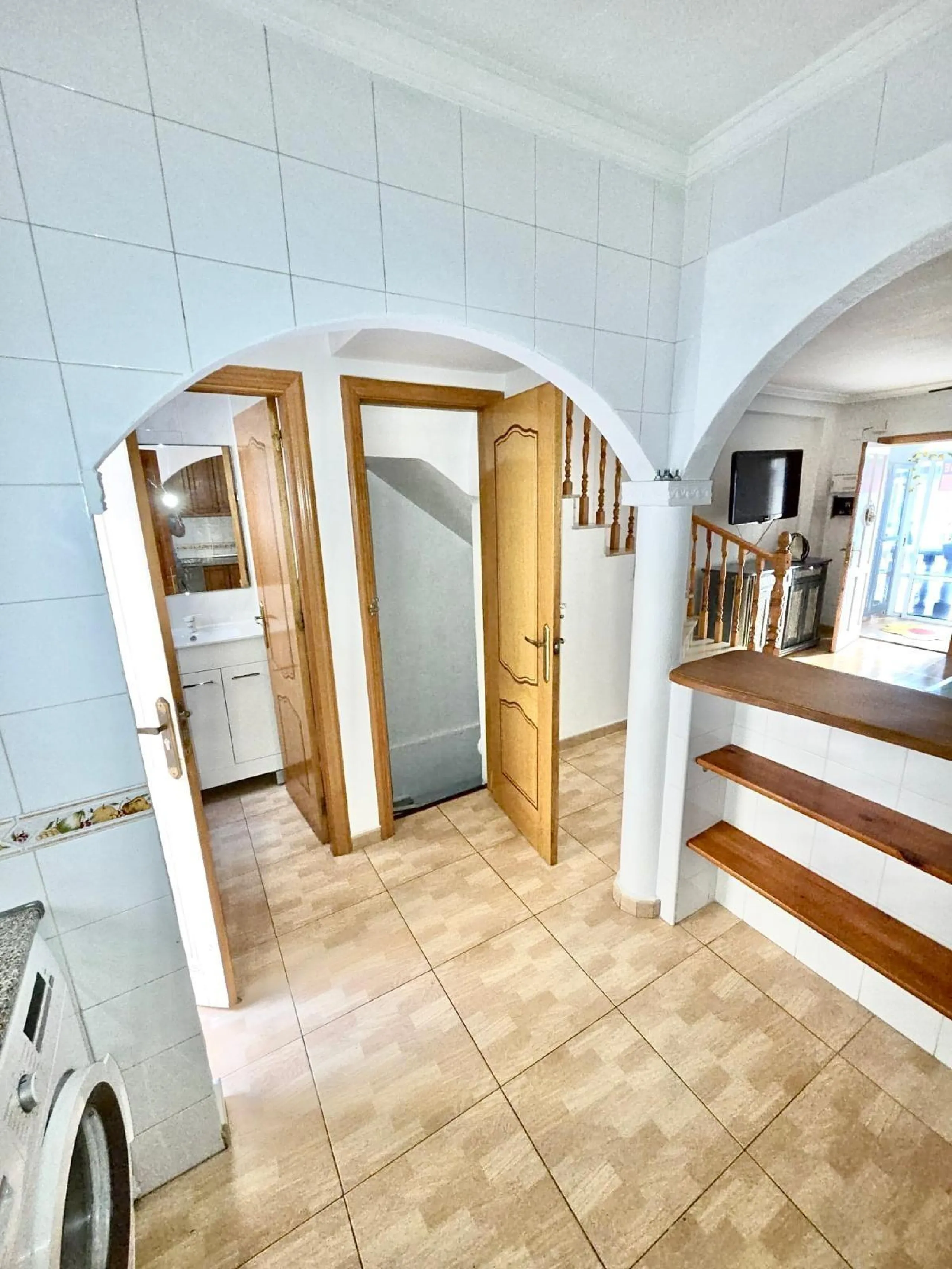 Townhouse with private garage, solarium and pool in Laguna, Orihuela Costa – excellent potential