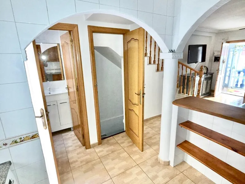 Townhouse with private garage, solarium and pool in Laguna, Orihuela Costa – excellent potential