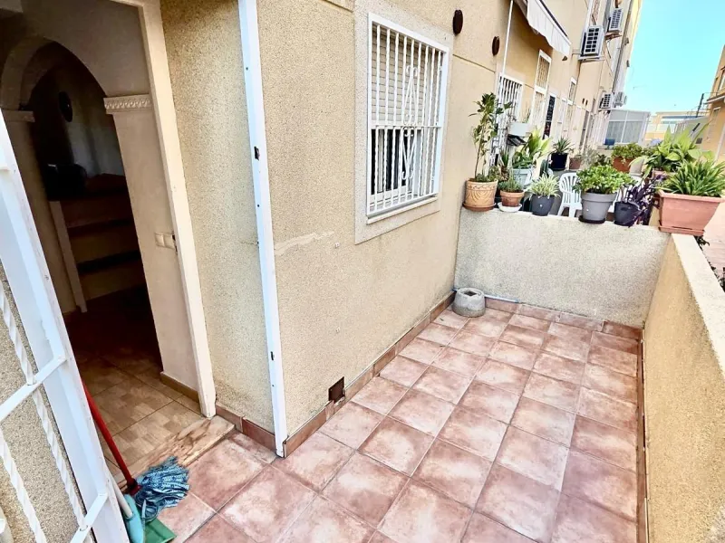Townhouse with private garage, solarium and pool in Laguna, Orihuela Costa – excellent potential
