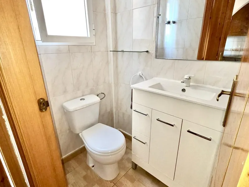 Townhouse with private garage, solarium and pool in Laguna, Orihuela Costa – excellent potential