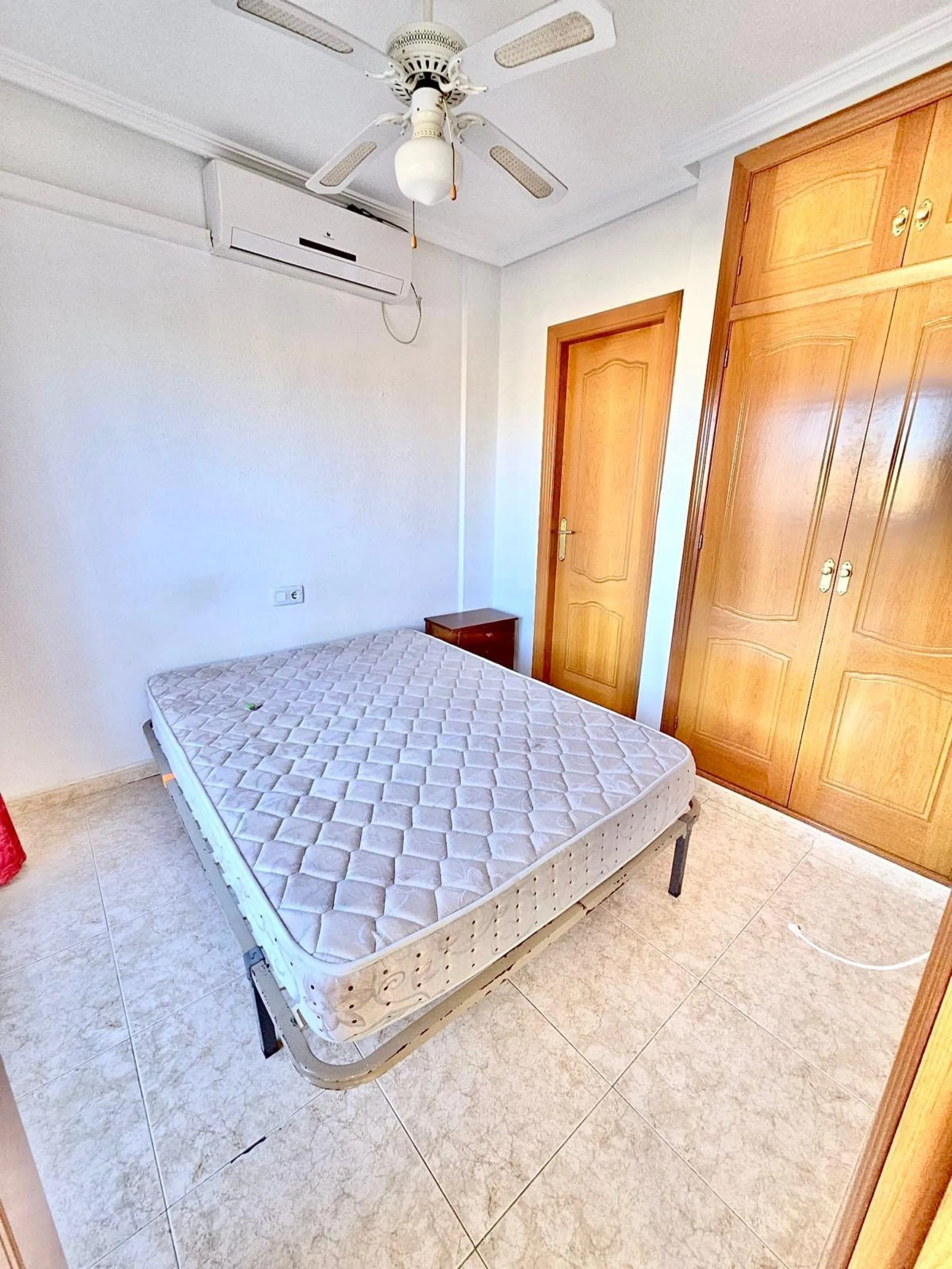 Townhouse with private garage, solarium and pool in Laguna, Orihuela Costa – excellent potential
