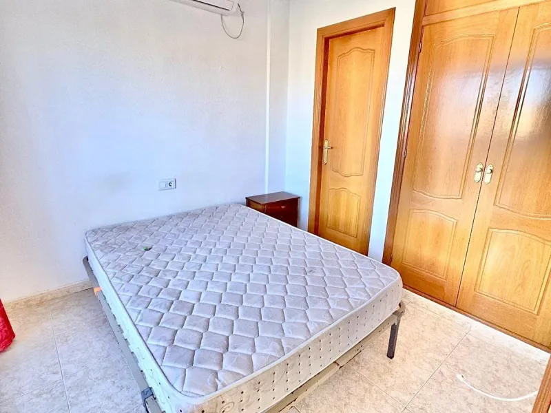 Townhouse with private garage, solarium and pool in Laguna, Orihuela Costa – excellent potential