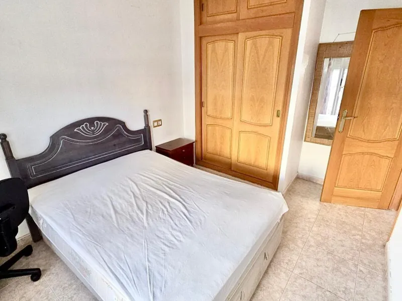 Townhouse with private garage, solarium and pool in Laguna, Orihuela Costa – excellent potential