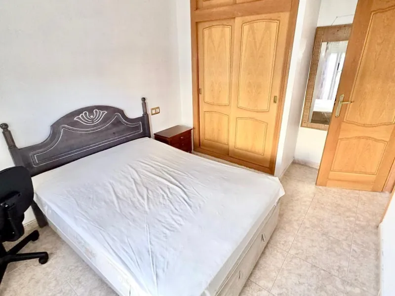 Townhouse with private garage, solarium and pool in Laguna, Orihuela Costa – excellent potential