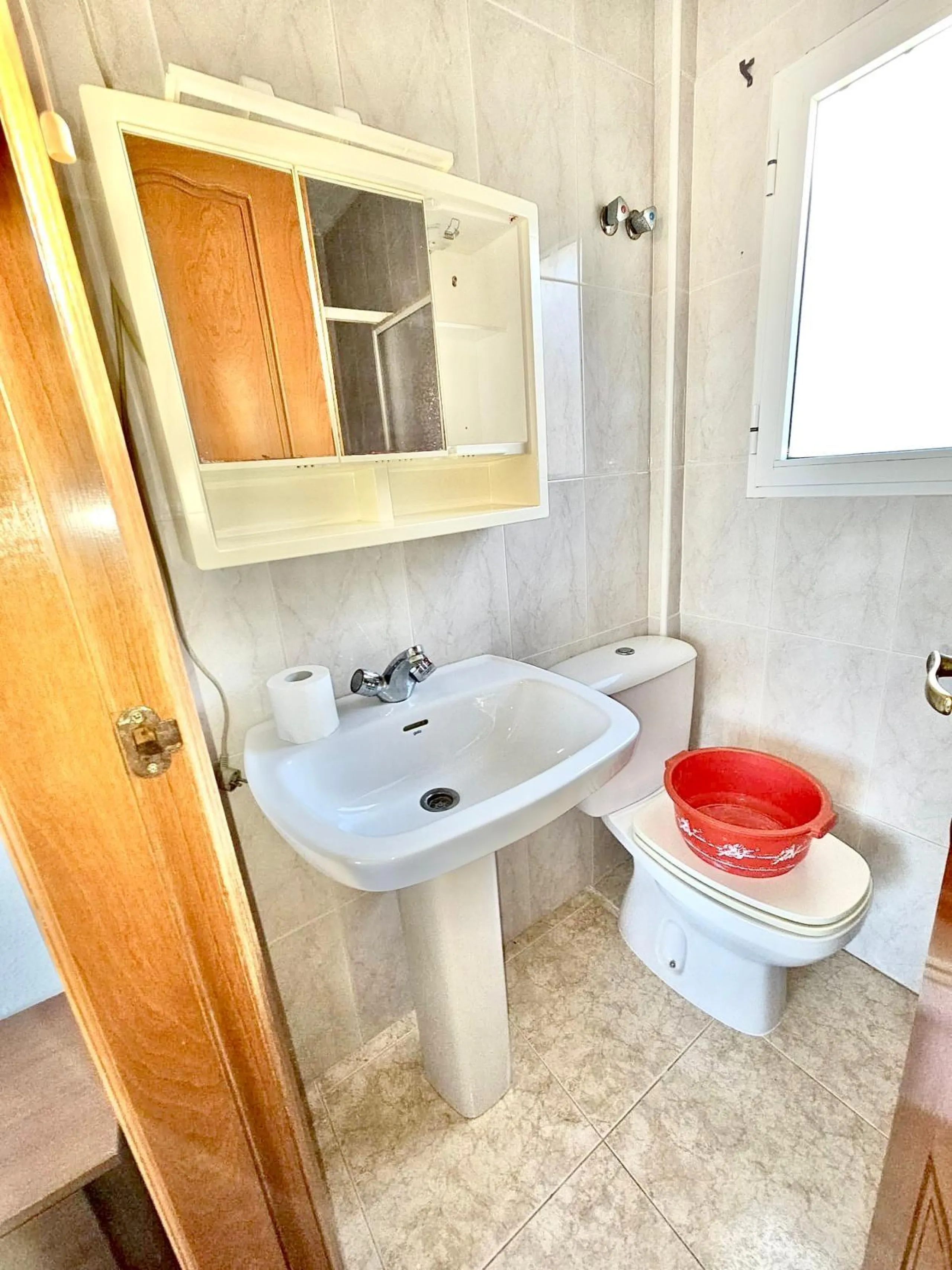 Townhouse with private garage, solarium and pool in Laguna, Orihuela Costa – excellent potential