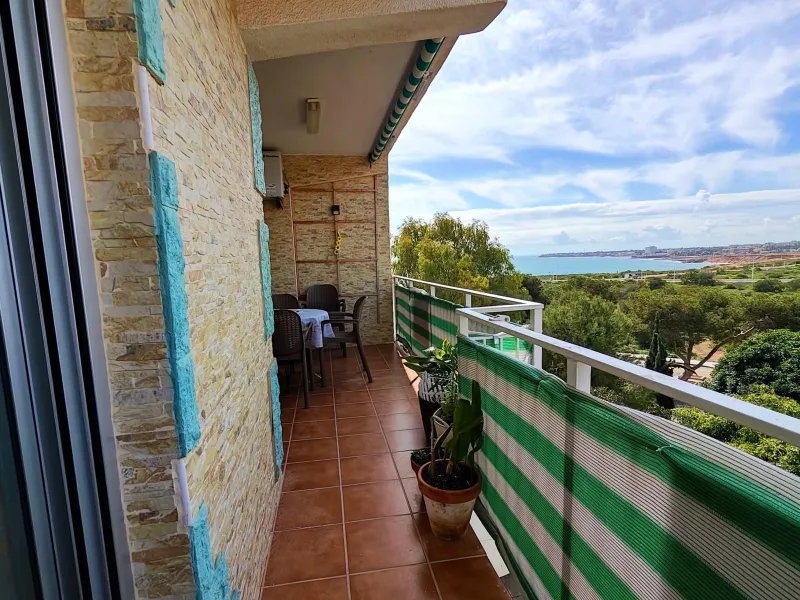 Piso en 1ª línea de mar con balcón panorámico en Punta Prima + parking incluido