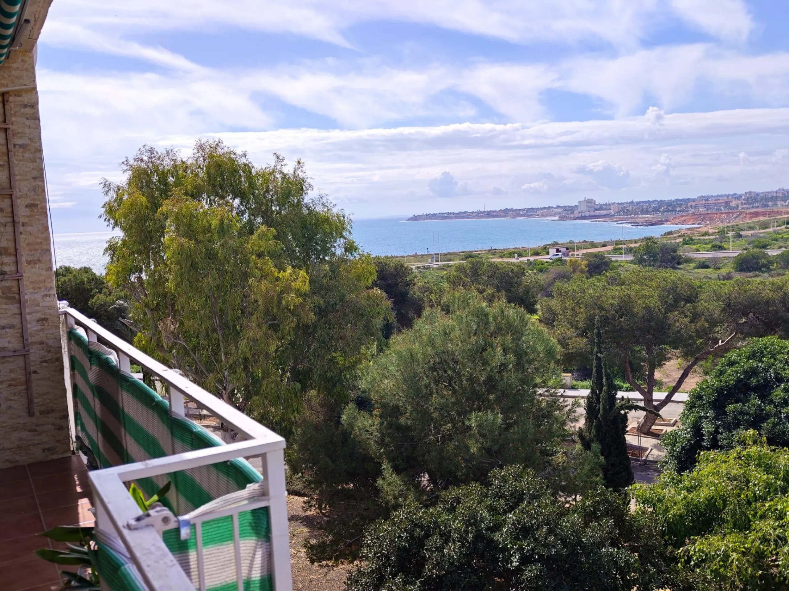 Piso en 1ª línea de mar con balcón panorámico en Punta Prima + parking incluido