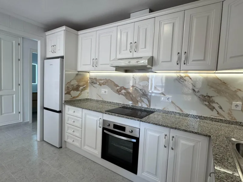 REFORMED APARTMENT IN LOMAS DE CAMPOAMOR WITH COMMUNITY POOL. 2 BED. 2 BATHS. AREA 83 M2.