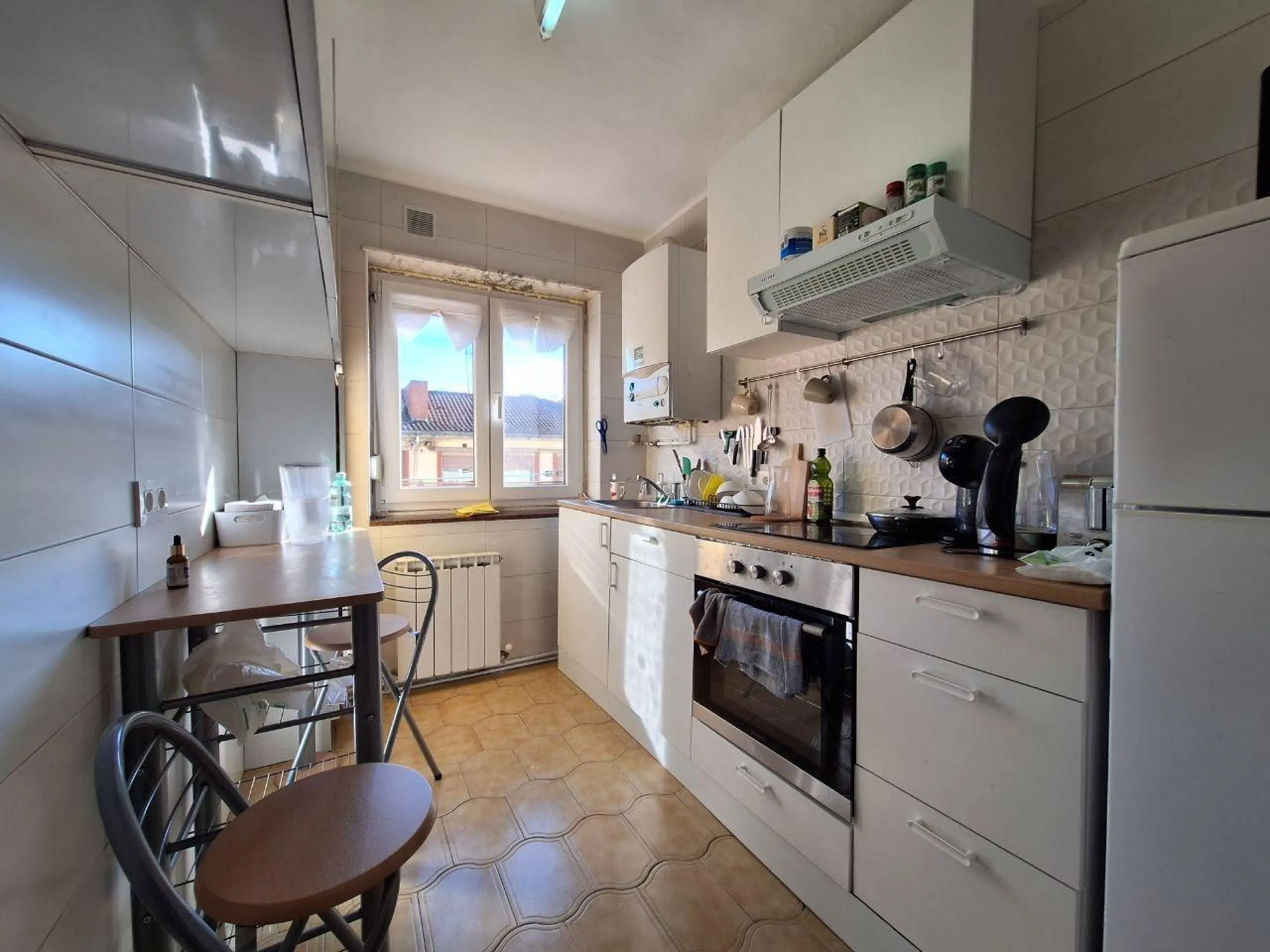 Piso de 3 habitaciones en Langreo — luminoso y en buen estado