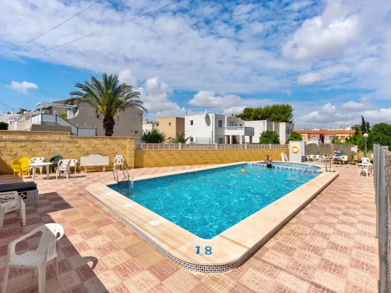 Bungalow on the ground floor with private garden and independent entrance in a residential complex with communal pool