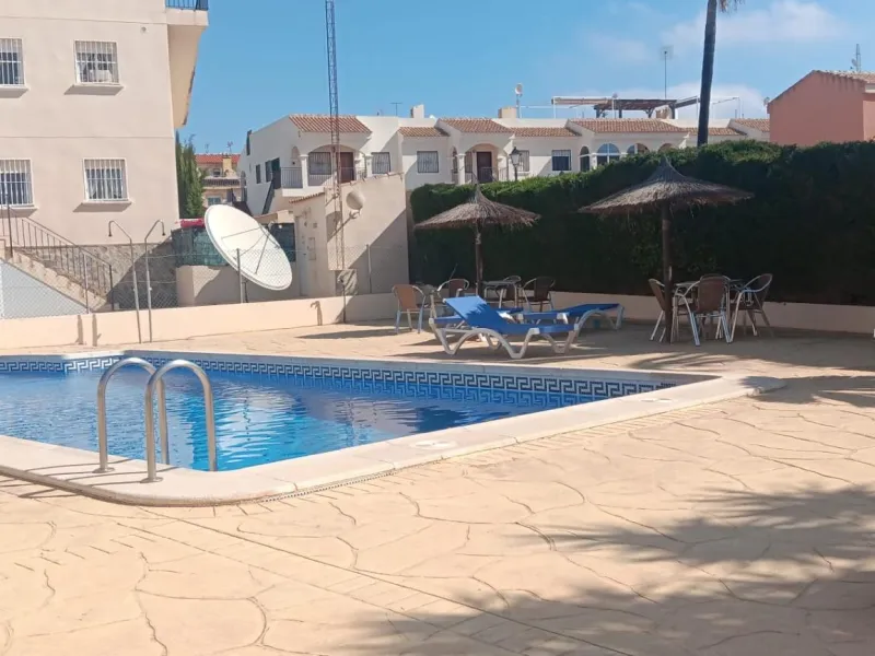 3 BEDROOM, 2 BATHROOM TOWNHOUSE WITH POOL IN ORIHUELA COSTA