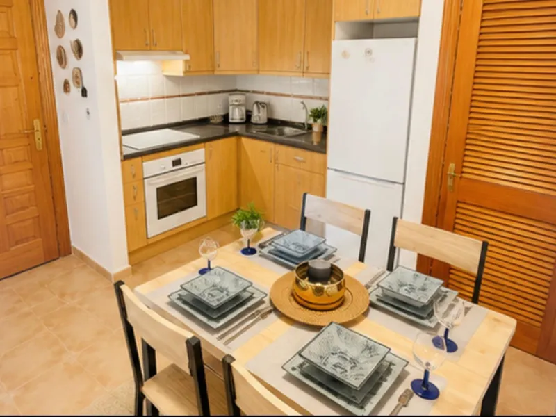 Apartamento en planta baja con jardín y gran piscina comunitaria en Cumbre del Sol