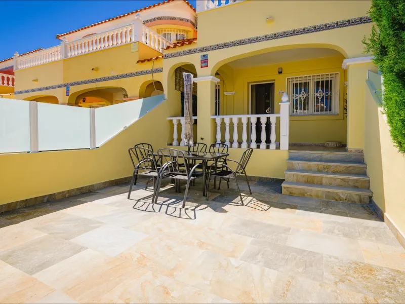 REFORMED TOWNHOUSE WITH SEA VIEWS IN "LAS FILIPINAS" ORIHUELA COSTA. WITH POOL. 3 BEDROOMS. 2 BATHROOMS. WITH A SURFACE OF 84 M2.