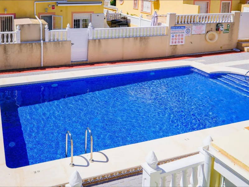 REFORMED TOWNHOUSE WITH SEA VIEWS IN "LAS FILIPINAS" ORIHUELA COSTA. WITH POOL. 3 BEDROOMS. 2 BATHROOMS. WITH A SURFACE OF 84 M2.