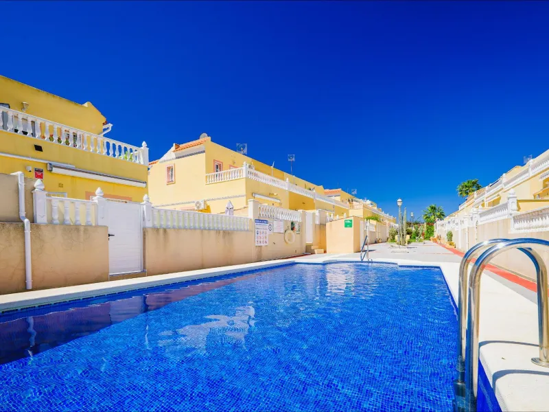REFORMED TOWNHOUSE WITH SEA VIEWS IN "LAS FILIPINAS" ORIHUELA COSTA. WITH POOL. 3 BEDROOMS. 2 BATHROOMS. WITH A SURFACE OF 84 M2.