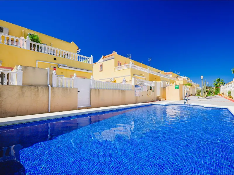 REFORMED TOWNHOUSE WITH SEA VIEWS IN "LAS FILIPINAS" ORIHUELA COSTA. WITH POOL. 3 BEDROOMS. 2 BATHROOMS. WITH A SURFACE OF 84 M2.