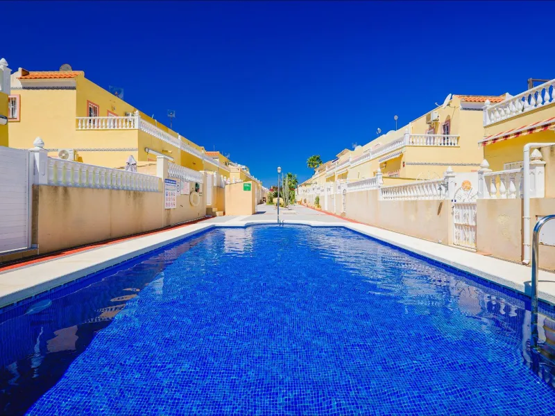 REFORMED TOWNHOUSE WITH SEA VIEWS IN "LAS FILIPINAS" ORIHUELA COSTA. WITH POOL. 3 BEDROOMS. 2 BATHROOMS. WITH A SURFACE OF 84 M2.
