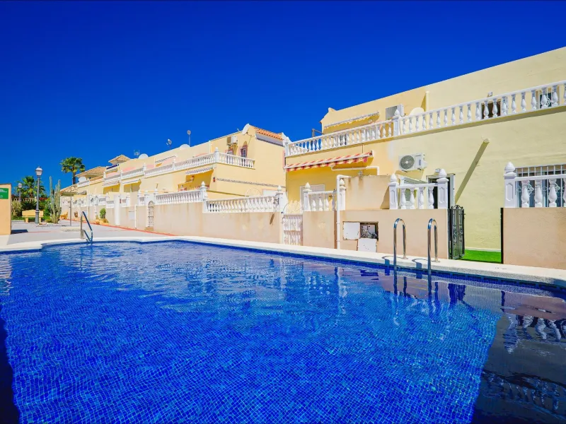 REFORMED TOWNHOUSE WITH SEA VIEWS IN "LAS FILIPINAS" ORIHUELA COSTA. WITH POOL. 3 BEDROOMS. 2 BATHROOMS. WITH A SURFACE OF 84 M2.