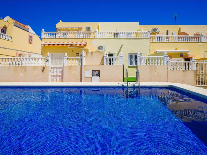 REFORMED TOWNHOUSE WITH SEA VIEWS IN "LAS FILIPINAS" ORIHUELA COSTA. WITH POOL. 3 BEDROOMS. 2 BATHROOMS. WITH A SURFACE OF 84 M2.