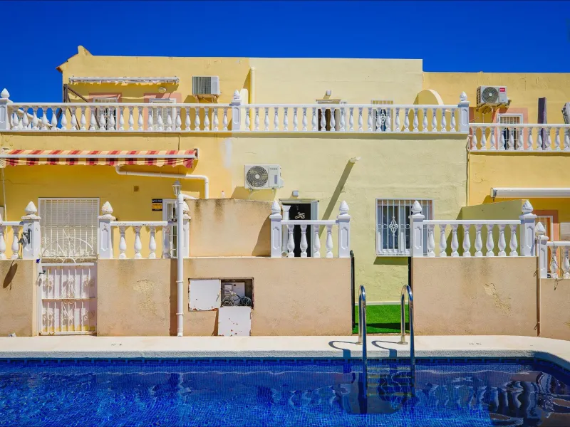REFORMED TOWNHOUSE WITH SEA VIEWS IN "LAS FILIPINAS" ORIHUELA COSTA. WITH POOL. 3 BEDROOMS. 2 BATHROOMS. WITH A SURFACE OF 84 M2.