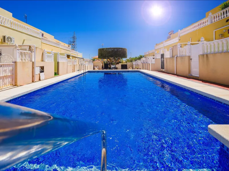 REFORMED TOWNHOUSE WITH SEA VIEWS IN "LAS FILIPINAS" ORIHUELA COSTA. WITH POOL. 3 BEDROOMS. 2 BATHROOMS. WITH A SURFACE OF 84 M2.