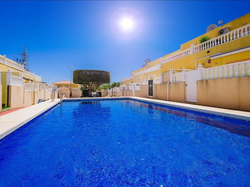 REFORMED TOWNHOUSE WITH SEA VIEWS IN "LAS FILIPINAS" ORIHUELA COSTA. WITH POOL. 3 BEDROOMS. 2 BATHROOMS. WITH A SURFACE OF 84 M2.