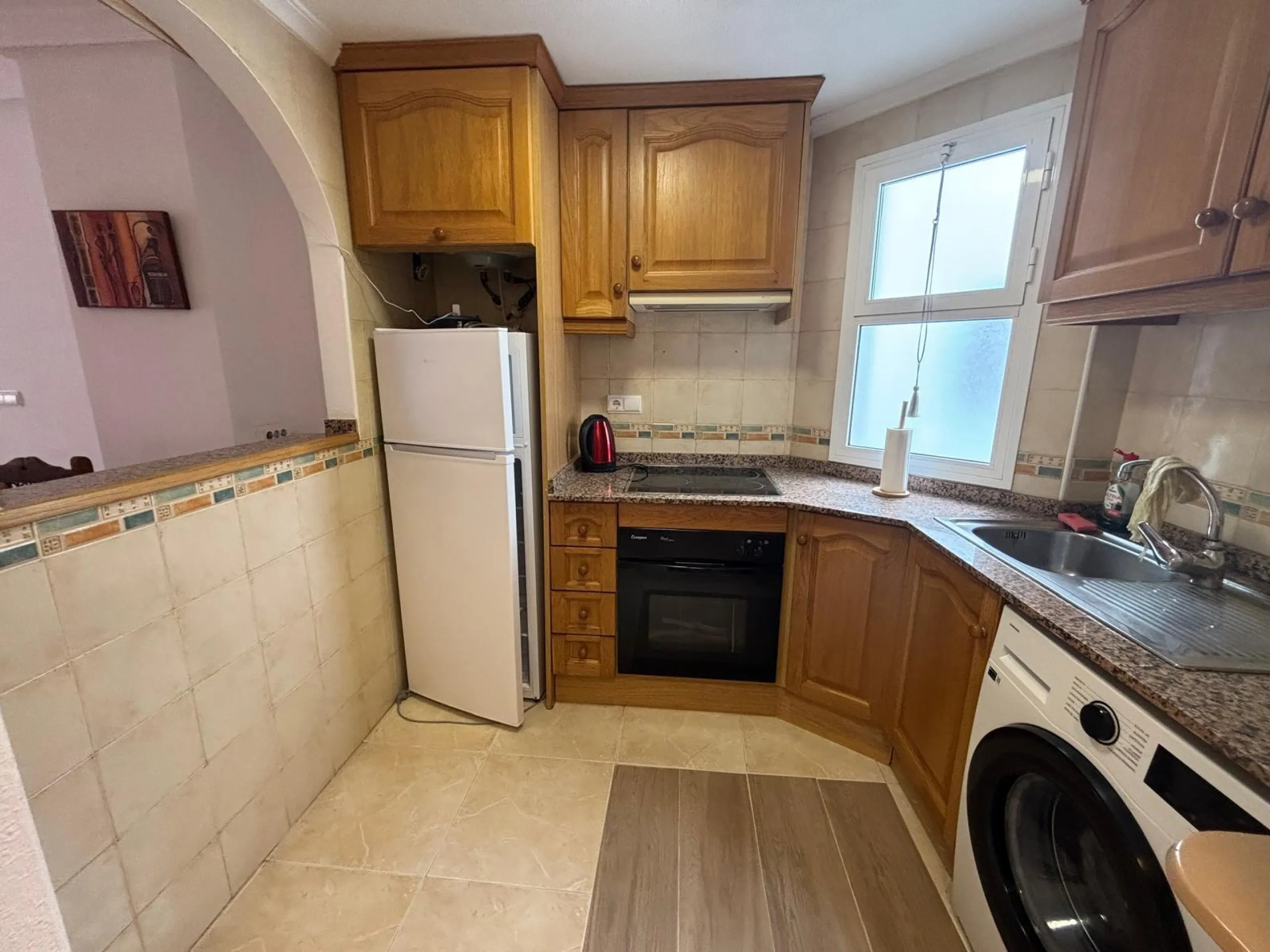 Bright south-facing apartment with garage just steps from the center!