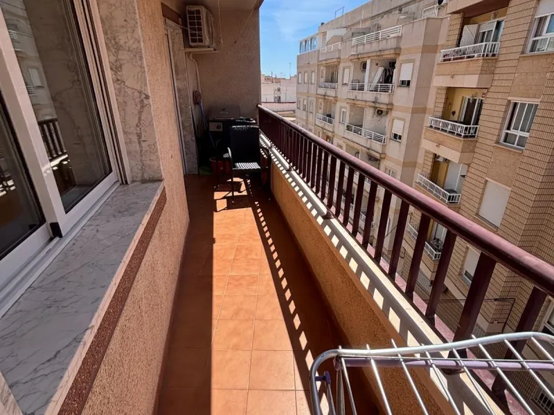 Bright south-facing apartment with garage just steps from the center!
