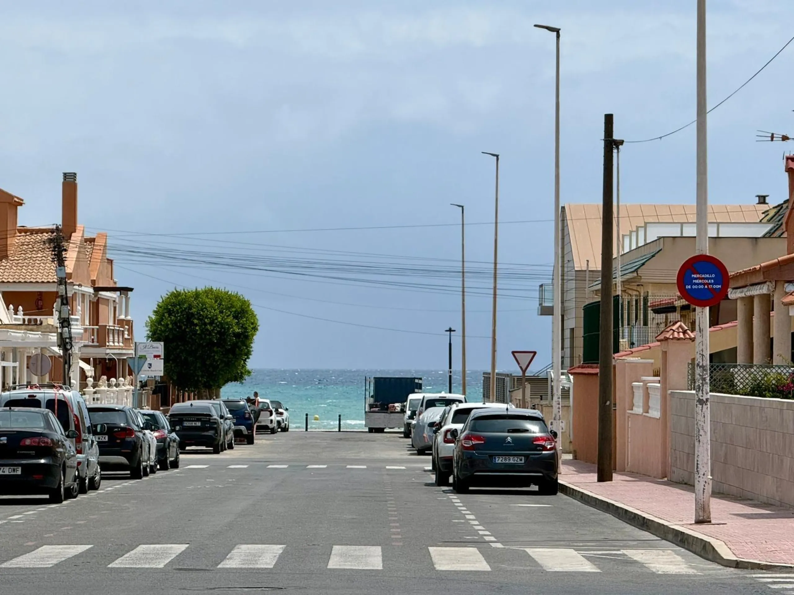 Spacious 4-bedroom apartment in La Mata with sea views, private solarium, and parking space