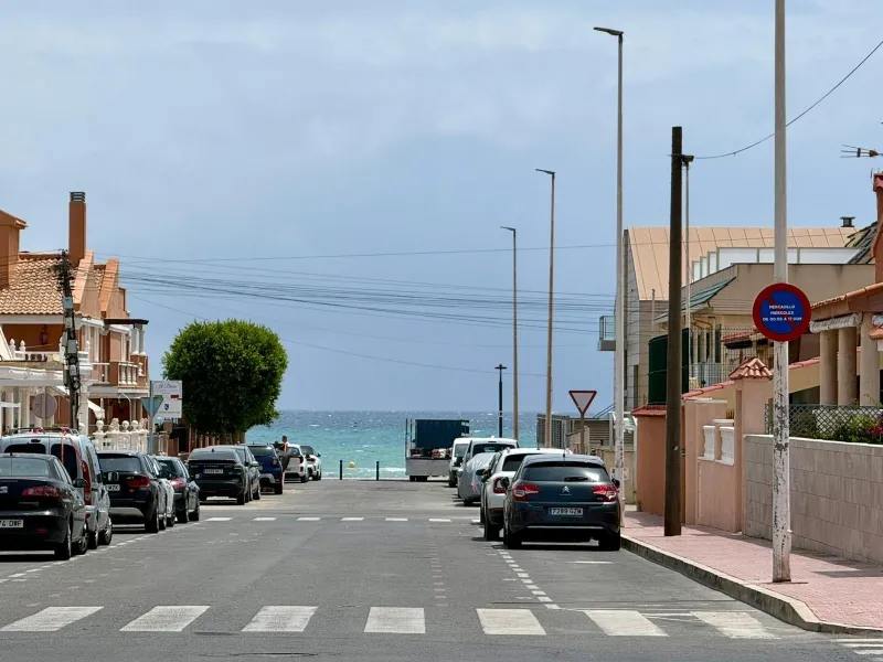 Spacious 4-bedroom apartment in La Mata with sea views, private solarium, and parking space