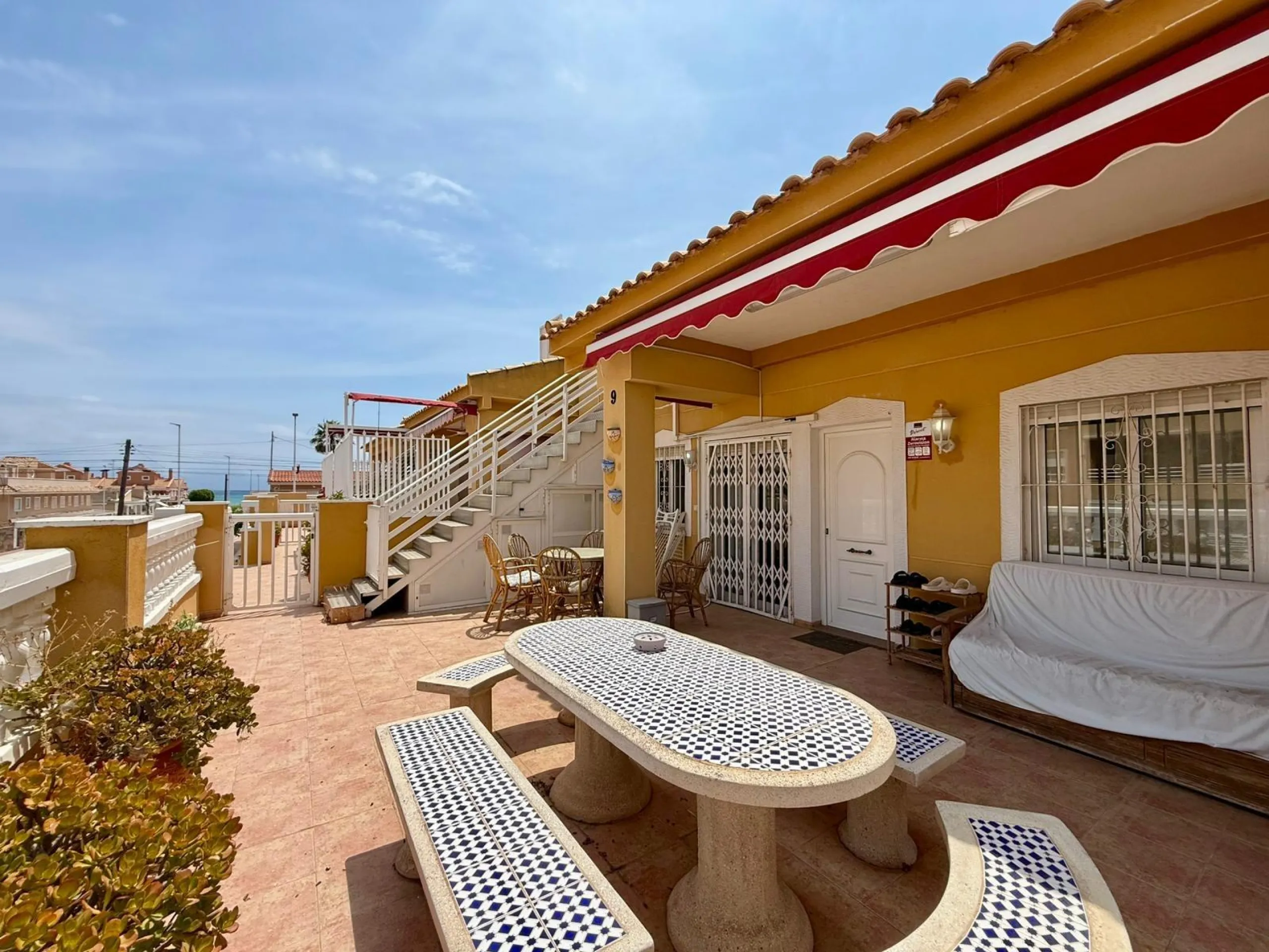 Spacious 4-bedroom apartment in La Mata with sea views, private solarium, and parking space